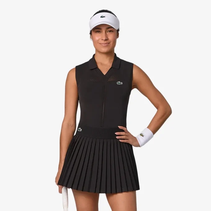 Polos de tennis sans manches en maille stretch pour femme Polos de tennis sans manches en maille stretch pour femme