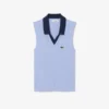 Polos de tennis sans manches en maille stretch pour femme Polos de tennis sans manches en maille stretch pour femme