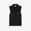 Polos de tennis sans manches en maille stretch pour femme Polos de tennis sans manches en maille stretch pour femme