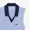 Polos de tennis sans manches en maille stretch pour femme Polos de tennis sans manches en maille stretch pour femme