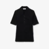 Polos femme slim fit en maille côtelée duveteuse Polos femme slim fit en maille côtelée duveteuse