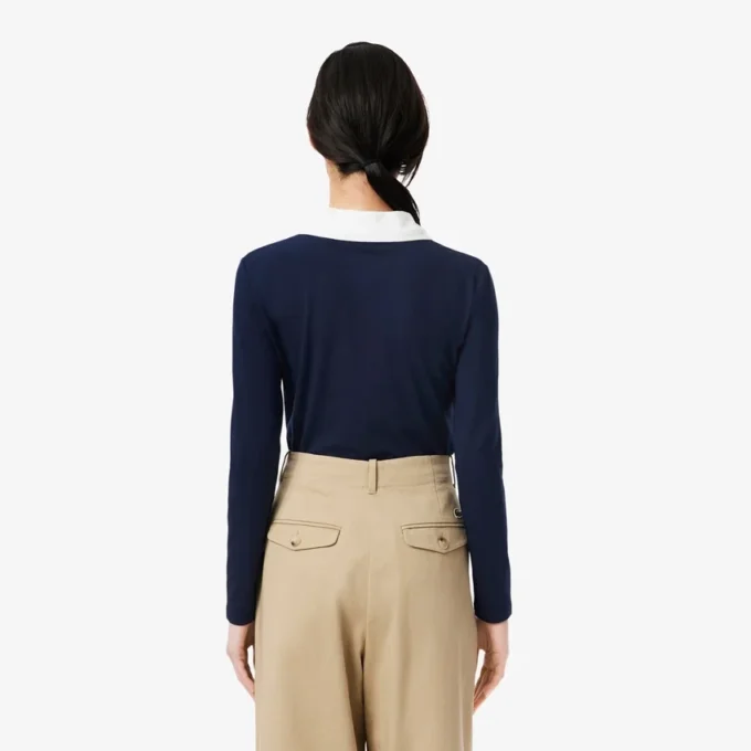Polos femme slim fit à manches longues et finitions raffinées Polos femme slim fit à manches longues et finitions raffinées