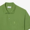 Polos Petit Piqué à la coupe classique avec détails brodés Polos Petit Piqué à la coupe classique avec détails brodés
