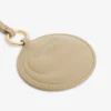Porte-clés avec breloques en forme de raquette de tennis et miroir L Porte-clés avec breloques en forme de raquette de tennis et miroir L