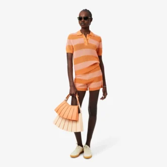 Pull à col polo en maille rayée