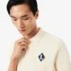 Pull à col polo rehaussé d’un badge « Made in France » Pull à col polo rehaussé d’un badge « Made in France »
