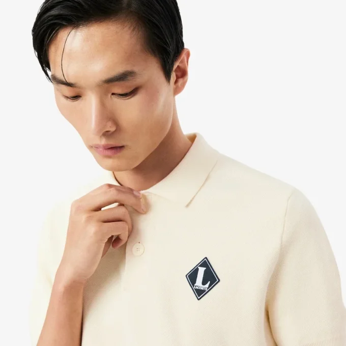 Pull à col polo rehaussé d’un badge « Made in France » Pull à col polo rehaussé d’un badge « Made in France »