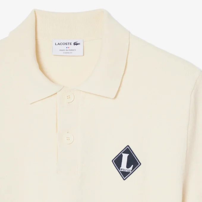 Pull à col polo rehaussé d’un badge « Made in France » Pull à col polo rehaussé d’un badge « Made in France »