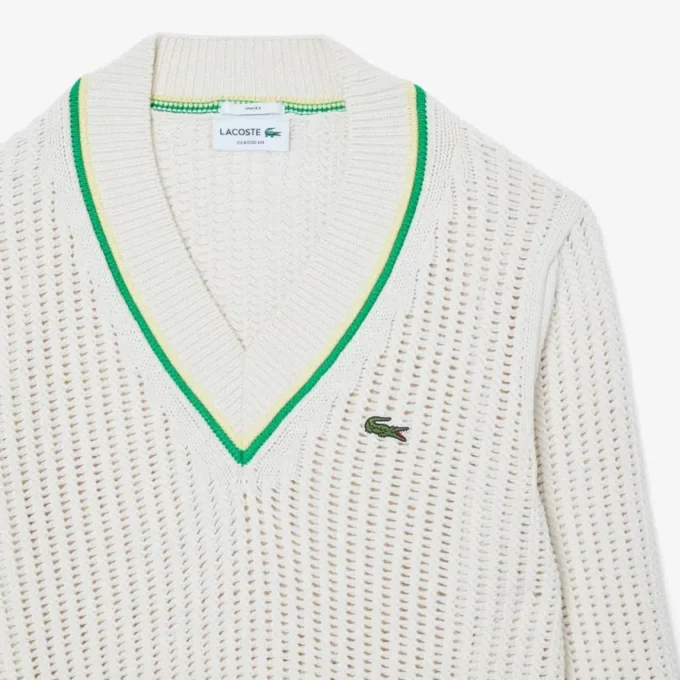 Pull de tennis rayé à col en V unisexe Pull de tennis rayé à col en V unisexe