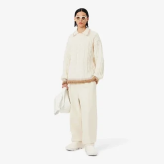Pull en laine à col polo et mailles torsadées