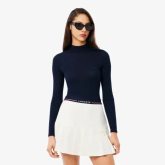 Pull en laine mérinos à col montant et côtes pour femme
