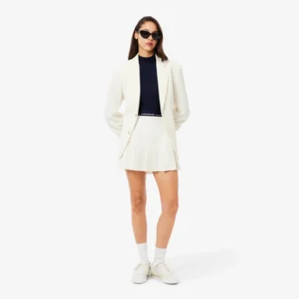 Pull en laine mérinos à col montant et côtes pour femme