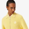 Pull zippé avec badge en coton Pull zippé avec badge en coton