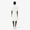 Robe polo plissée avec détails brodés Runway Robe polo plissée avec détails brodés Runway