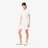 Robe polo plissée en piqué stretch