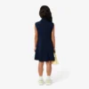 Robe polo sans manches en piqué stretch pour enfant Robe polo sans manches en piqué stretch pour enfant