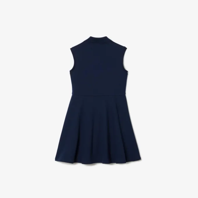 Robe polo sans manches en piqué stretch pour enfant Robe polo sans manches en piqué stretch pour enfant