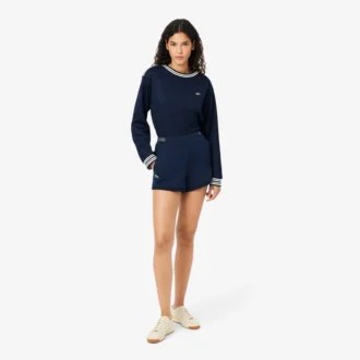 Short de tennis Heritage avec badge Ultra Dry Short de tennis Heritage avec badge Ultra Dry