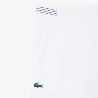 Short de tennis Heritage avec badge Ultra Dry Short de tennis Heritage avec badge Ultra Dry