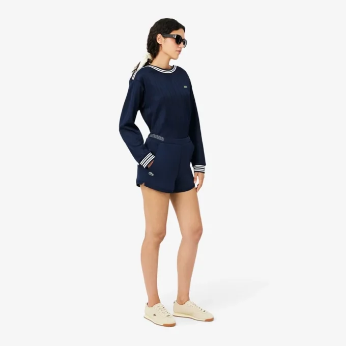 Short de tennis Heritage avec badge Ultra Dry Short de tennis Heritage avec badge Ultra Dry