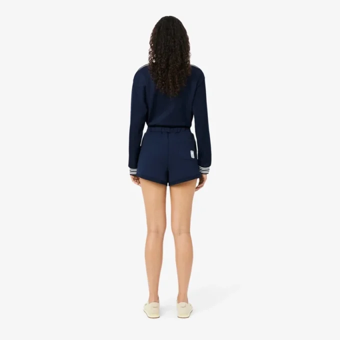 Short de tennis Heritage avec badge Ultra Dry Short de tennis Heritage avec badge Ultra Dry
