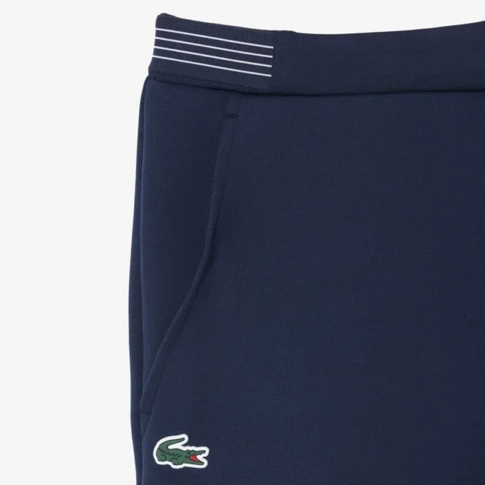 Short de tennis Heritage avec badge Ultra Dry Short de tennis Heritage avec badge Ultra Dry