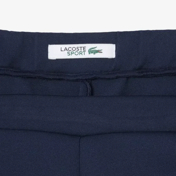 Short de tennis Heritage avec badge Ultra Dry Short de tennis Heritage avec badge Ultra Dry