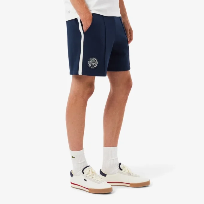 Short de tennis Heritage Ultra Dry Badge Accent pour homme Short de tennis Heritage Ultra Dry Badge Accent pour homme