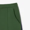 Short de tennis Heritage Ultra Dry Badge Accent pour homme Short de tennis Heritage Ultra Dry Badge Accent pour homme