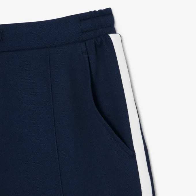 Short de tennis Heritage Ultra Dry Badge Accent pour homme Short de tennis Heritage Ultra Dry Badge Accent pour homme