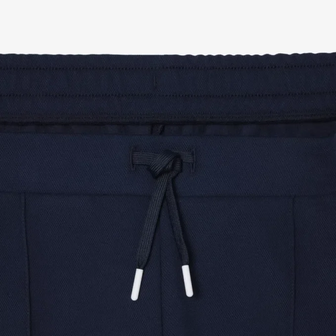 Short de tennis Heritage Ultra Dry Badge Accent pour homme Short de tennis Heritage Ultra Dry Badge Accent pour homme
