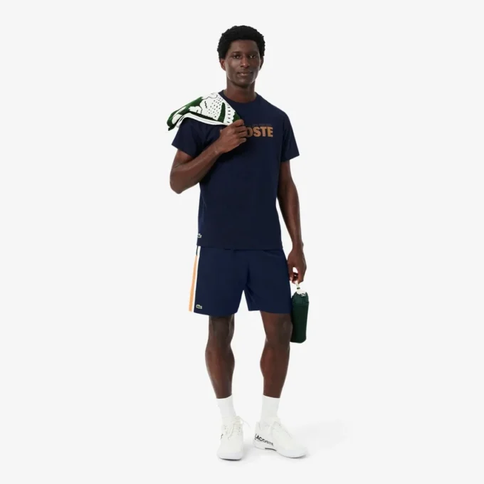 Short de tennis léger à rayures colorées pour homme