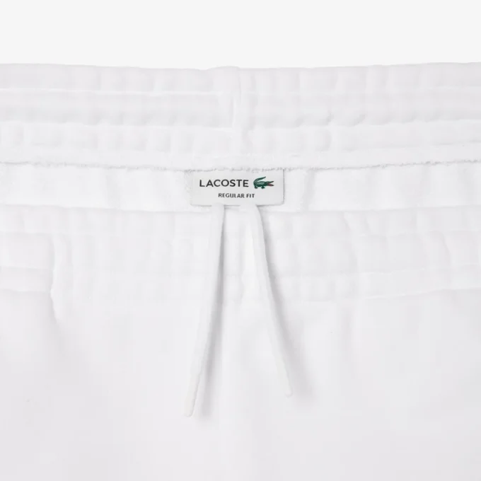 Short en molleton pour homme, coupe classique, avec broderie Short en molleton pour homme, coupe classique, avec broderie