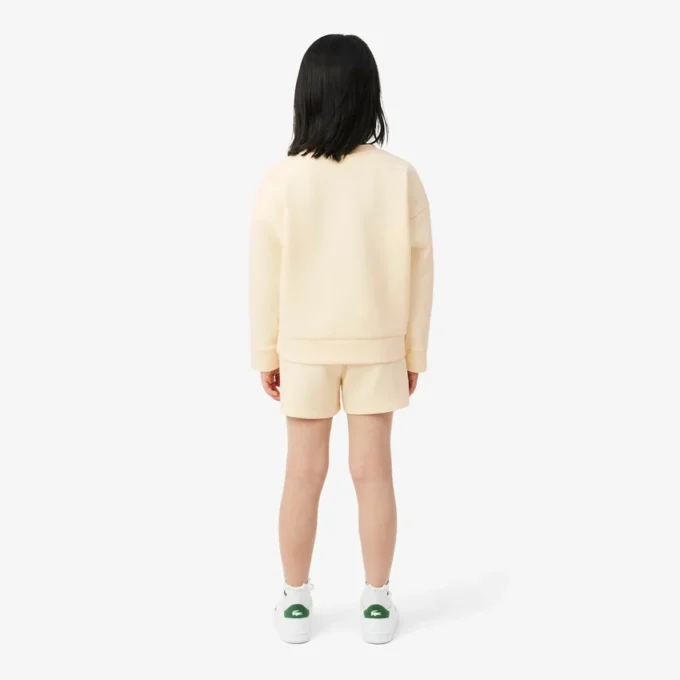 Short en néoprène brodé Short en néoprène brodé