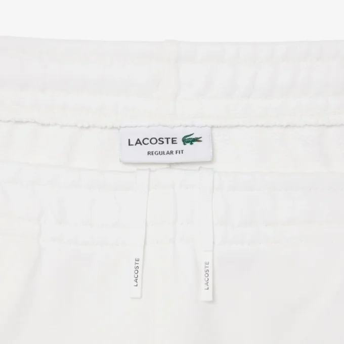Short en polaire à rayures et logo, coupe classique Short en polaire à rayures et logo, coupe classique