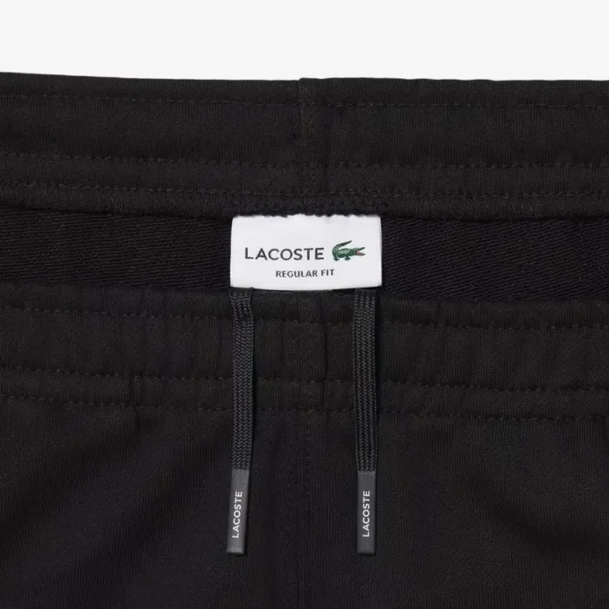 Short en polaire à rayures et logo, coupe classique Short en polaire à rayures et logo, coupe classique