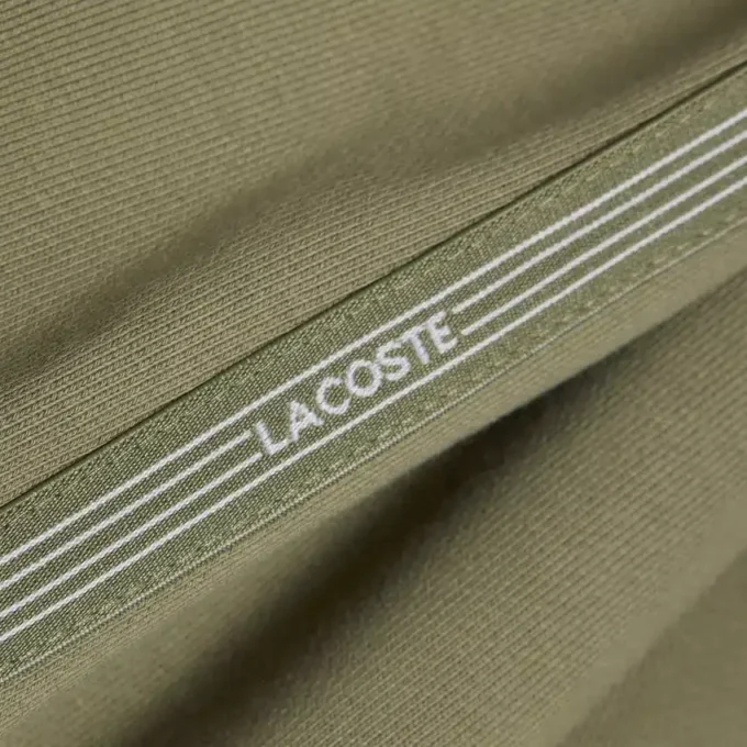 Short en polaire à rayures et logo, coupe classique Short en polaire à rayures et logo, coupe classique
