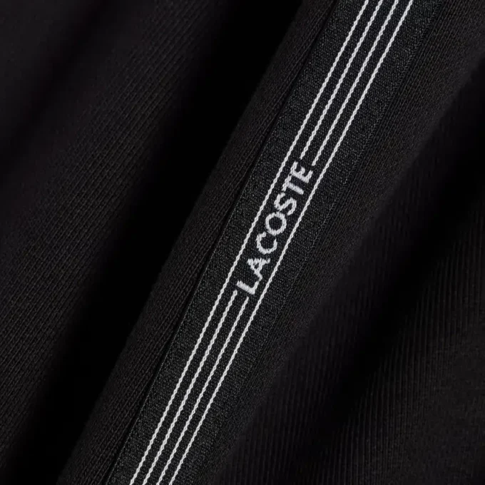 Short en polaire à rayures et logo, coupe classique Short en polaire à rayures et logo, coupe classique