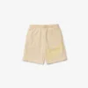 Short oversize en molleton de coton biologique imprimé crocodile pour homme Short oversize en molleton de coton biologique imprimé crocodile pour homme