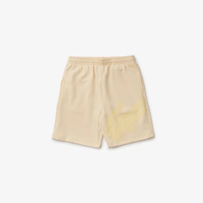 Short oversize en molleton de coton biologique imprimé crocodile pour homme Short oversize en molleton de coton biologique imprimé crocodile pour homme