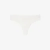 Slip string en pointelle extensible Slip string en pointelle extensible