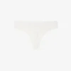 Slip string en pointelle extensible Slip string en pointelle extensible