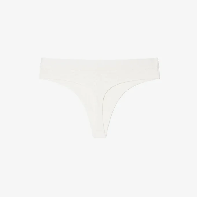 Slip string en pointelle extensible Slip string en pointelle extensible