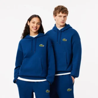 Sweat à capuche unisexe ample avec badge