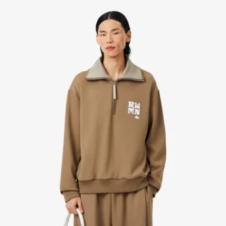 Sweats à col montant et fermeture éclair avec badge, inspirés des défilés