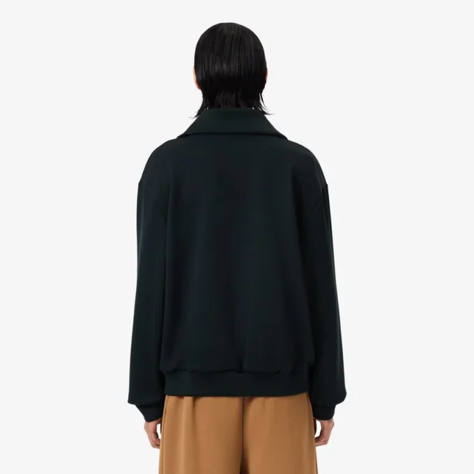 Sweats à col montant et fermeture éclair avec badge, inspirés des défilés