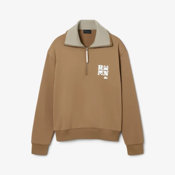 Sweats à col montant et fermeture éclair avec badge, inspirés des défilés