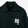 Sweats à col montant et fermeture éclair avec badge, inspirés des défilés