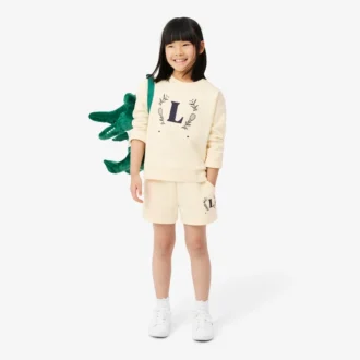Sweats en néoprène avec écusson brodé Sweats en néoprène avec écusson brodé