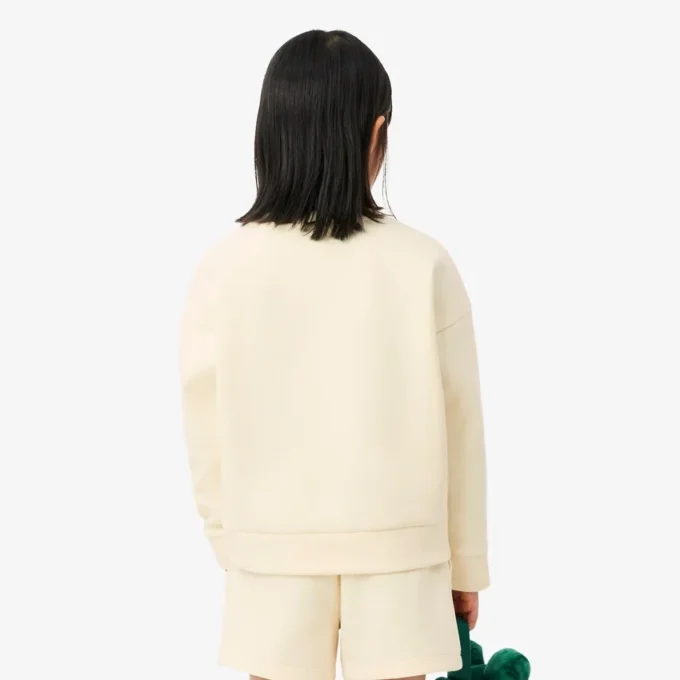 Sweats en néoprène avec écusson brodé Sweats en néoprène avec écusson brodé